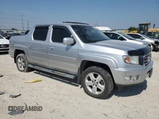 2012 Honda Ridgeline RTL with VIN 5FPYK1F50CB001376, listed as a Copart auction lot 66402154 with 166,481 mi miles and Salvage Title. Bid and sale history available at carsss.com. Image 4.