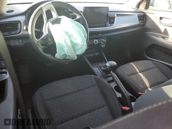 2022 Kia Rio LX with VIN 3KPA24AD3NE479603, listed as a Copart auction lot 49273645 with 67,286 mi miles and Salvage Title. Bid and sale history available at DreamBid. Image 8.