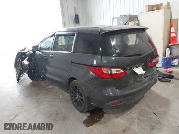 2014 Mazda 5 Sport z VIN JM1CW2BLXE0164748, wystawiony jako IAAI lot #42064606 z przebiegiem 140 169 mil mil oraz . Historia ofert i sprzedaży dostępna na DreamBid. Obrazek 3.