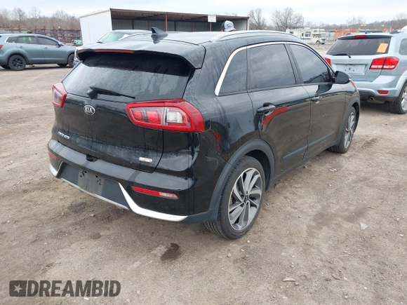 2017 Kia Niro Touring with VIN KNDCE3LC0H5040261, listed as a IAAI auction lot 41751900 with 100,194 mi miles. Bid and sale history available at carsss.com. Image 4.
