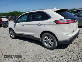 2019 Ford Edge SEL z VIN 2FMPK4J98KBB34524, wystawiony jako Copart lot #57313615 z przebiegiem 112 193 mil mil oraz Szkoda całkowita • Salvage title. Historia ofert i sprzedaży dostępna na DreamBid. Obrazek 2.