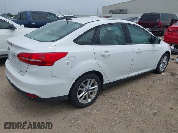 2017 Ford Focus SE with VIN 1FADP3F26HL223697, listed as a IAAI auction lot 42773677 with 176,629 mi miles and . Bid and sale history available at DreamBid. Image 4.