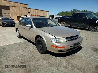 1997 Nissan Maxima GXE z VIN JN1CA21DXVT877062, wystawiony jako Copart lot #49411185 z przebiegiem 249 941 mil mil oraz Szkoda całkowita • Salvage title. Historia ofert i sprzedaży dostępna na DreamBid. Obrazek 10.