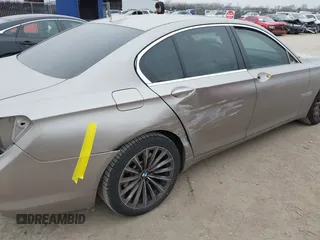 2012 BMW 7 Series 740i with VIN WBAKA4C51CC613670, listed as a IAAI auction lot 41582639 with 149,753 mi miles. Bid and sale history available at carsss.com. Image 6.