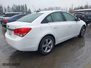 2015 Chevrolet Cruze LT with VIN 1G1PE5SB7F7173499, listed as a IAAI auction lot 41861376 with 147,608 mi miles. Bid and sale history available at carsss.com. Image 4.