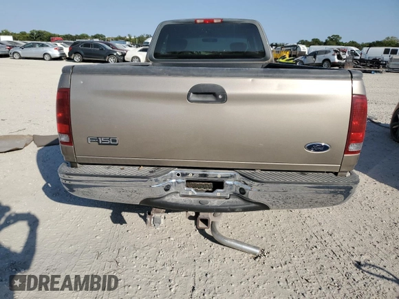 2002 Ford F-150 XL with VIN 1FTRX17L22NA48307, listed as a Copart auction lot 74238074 with 80,010 mi miles and Salvage title. Bid and sale history available at DreamBid. Image 6.