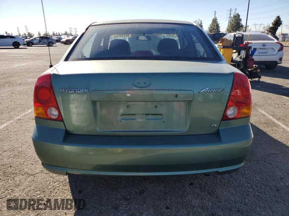 2003 Hyundai Accent GL with VIN KMHCG45C63U430403, listed as a Copart auction lot 86430724 with 74,200 mi miles and Salvage Title. Bid and sale history available at carsss.com. Image 6.