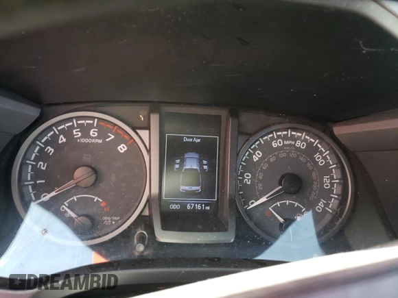 2022 Toyota Tacoma SR with VIN 3TMCZ5AN4NM470997, listed as a Copart auction lot 55165855 with 67,161 mi miles and Salvage title. Bid and sale history available at DreamBid. Image 9.