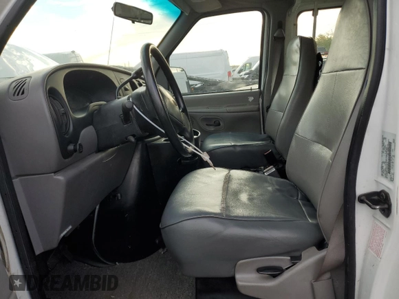 1999 Ford Econoline Passenger XL with VIN 1FBSS31L2XHA95612, listed as a Copart auction lot 72615104 with 211,283 mi miles and Salvage Title. Bid and sale history available at DreamBid. Image 7.