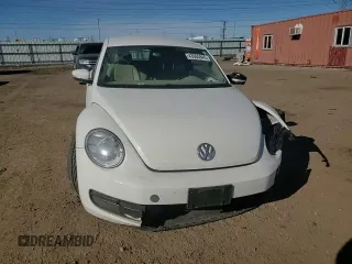 2012 Volkswagen Beetle 2.5L w/Sound/Nav PZEV with VIN 3VWJP7AT4CM657836, listed as a Copart auction lot 43065845 with 96,854 mi miles and Salvage Title. Bid and sale history available at DreamBid. Image 11.