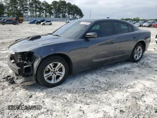 2019 Dodge Charger SXT with VIN 2C3CDXBG1KH720320, listed as a Copart auction lot 54545895 with 211,051 mi miles and Salvage title. Bid and sale history available at DreamBid. Image 1.