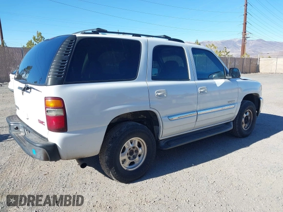 2002 GMC Yukon SLT z VIN 1GKEC13T32R256757, wystawiony jako IAAI lot #41657945 z przebiegiem 331 831 mil mil oraz . Historia ofert i sprzedaży dostępna na DreamBid. Obrazek 4.