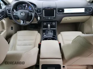 2011 Volkswagen Touareg Sport with VIN WVGFF9BP8BD002982, listed as a Copart auction lot 53958555 with 156,742 mi miles and Salvage Title. Bid and sale history available at DreamBid. Image 8.