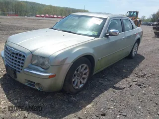 2005 Chrysler 300 with VIN 2C3AA63H65H522824, listed as a IAAI auction lot 42133787 with 266,724 mi miles. Bid and sale history available at carsss.com. Image 2.