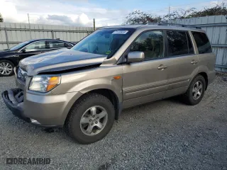 2006 Honda Pilot EX-L with VIN 5FNYF28586B048997, listed as a Copart auction lot 71120924 with 215,080 mi miles and Salvage Title. Bid and sale history available at carsss.com. Image 1.