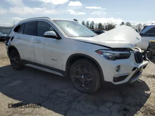 2018 BMW X1 xDrive28i with VIN WBXHT3C30J5F92074, listed as a Copart auction lot 51069535 with 116,381 mi miles and Salvage Title. Bid and sale history available at carsss.com. Image 4.