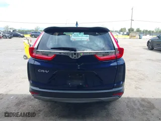 2017 Honda CR-V LX with VIN 7FARW5H39HE015356, listed as a IAAI auction lot 42028467 with 149,785 mi miles. Bid and sale history available at carsss.com. Image 17.