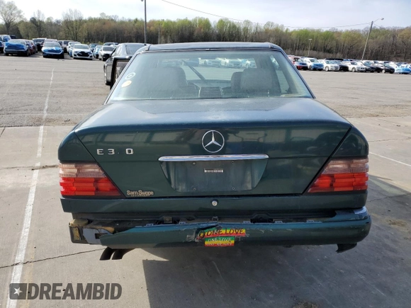 1995 Mercedes-Benz E Class with VIN WDBEA32E1SC242552, listed as a Copart auction lot 52433285 with 211,669 mi miles and Salvage Title. Bid and sale history available at carsss.com. Image 6.