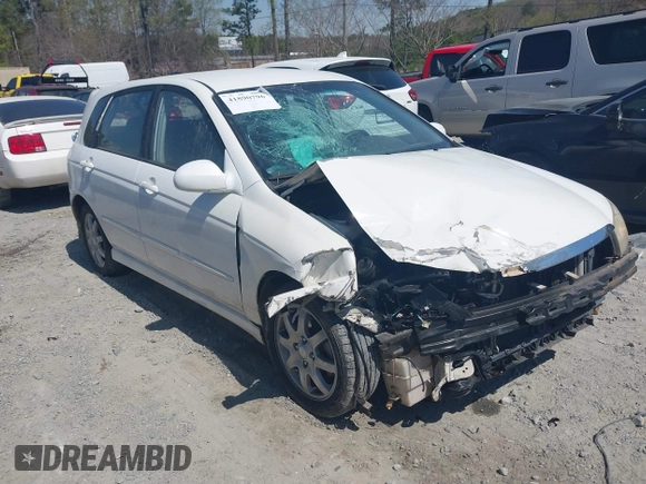2006 Kia Spectra with VIN KNAFE162765318099, listed as a IAAI auction lot 41890796 with 241,431 mi miles. Bid and sale history available at carsss.com. Image 1.