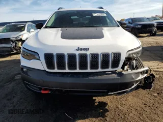 2022 Jeep Cherokee Trailhawk with VIN 1C4PJMBX3ND505107, listed as a Copart auction lot 77418384 with 12,952 mi miles and Clean Title. Bid and sale history available at carsss.com. Image 5.