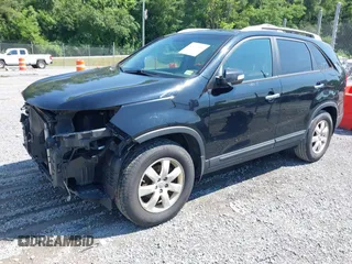 2013 Kia Sorento LX with VIN 5XYKT3A65DG414072, listed as a IAAI auction lot 42602334 with 149,878 mi miles and . Bid and sale history available at DreamBid. Image 2.