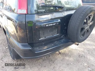 1998 Honda CR-V LX z VIN JHLRD1740WC076533, wystawiony jako IAAI lot #42046673 z przebiegiem 201 946 mil mil oraz . Historia ofert i sprzedaży dostępna na DreamBid. Obrazek 12.