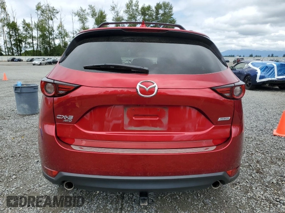 2019 Mazda CX-5 Grand Touring with VIN JM3KFBDM2K0639247, listed as a Copart auction lot 64060045 with 69,563 mi miles and Salvage title. Bid and sale history available at DreamBid. Image 6.