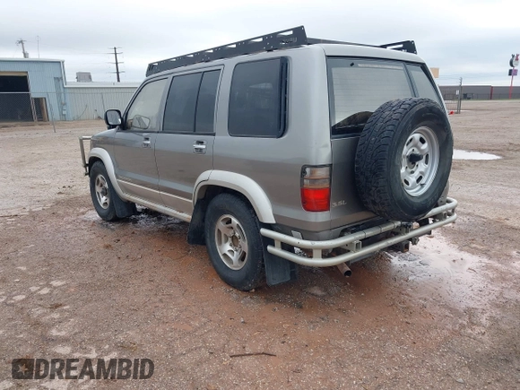 2001 Isuzu Trooper S with VIN JACDJ58XX17J18173, listed as a IAAI auction lot 42142403 with Not provided miles and . Bid and sale history available at DreamBid. Image 3.