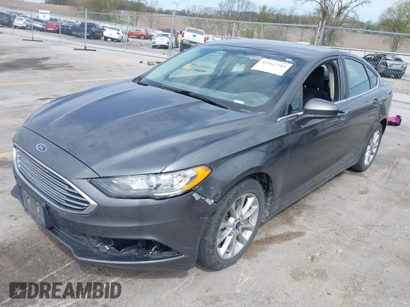 2017 Ford Fusion SE with VIN 3FA6P0H7XHR228922, listed as a IAAI auction lot 42162345 with 186,000 mi miles and . Bid and sale history available at DreamBid. Image 2.