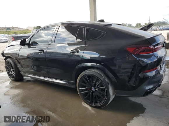 2023 BMW X6 M50i with VIN 5UXCY8C01P9S00552, listed as a Copart auction lot 84193154 with 16,590 mi miles and Salvage Title. Bid and sale history available at carsss.com. Image 2.