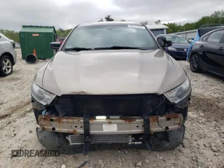 2013 Ford Police Interceptor z VIN 1FAHP2M81DG124615, wystawiony jako Copart lot #56727015 z przebiegiem 190 319 mil mil oraz Czysty tytuł • Clean title. Historia ofert i sprzedaży dostępna na DreamBid. Obrazek 5.