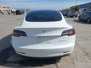 2018 Tesla Model 3 Long Range Battery with VIN 5YJ3E1EB7JF108519, listed as a IAAI auction lot 41835266 with 120,662 mi miles and . Bid and sale history available at DreamBid. Image 16.