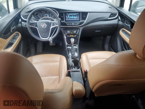 2017 Buick Encore Essence with VIN KL4CJCSBXHB099706, listed as a Copart auction lot 89332975 with 98,045 mi miles and Salvage Title. Bid and sale history available at DreamBid. Image 8.