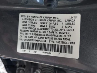 2019 Honda Civic Si z VIN 2HGFC1E55KH701354, wystawiony jako IAAI lot #42115508 z przebiegiem Nie podano mil oraz . Historia ofert i sprzedaży dostępna na DreamBid. Obrazek 9.