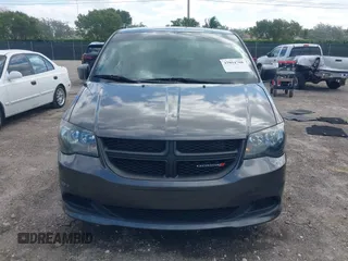 2015 Dodge Grand Caravan American Value with VIN 2C4RDGBGXFR682995, listed as a IAAI auction lot 41994708 with 142,725 mi miles and . Bid and sale history available at DreamBid. Image 12.