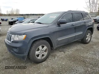 2013 Jeep Grand Cherokee Laredo with VIN 1C4RJFAG6DC630354, listed as a Copart auction lot 49773425 with 113,291 mi miles and Salvage Title. Bid and sale history available at carsss.com. Image 1.
