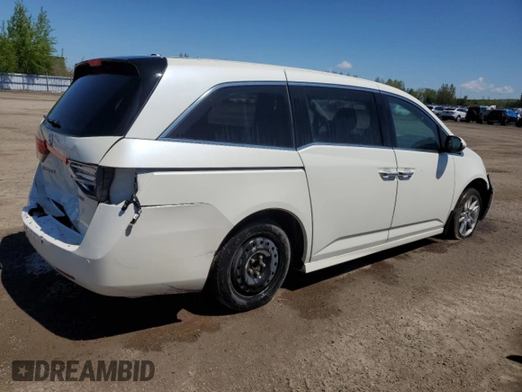 2015 Honda Odyssey Touring Elite with VIN 5FNRL5H92FB504977, listed as a Copart auction lot 56657195 with 189,438 mi miles and Salvage title. Bid and sale history available at DreamBid. Image 3.