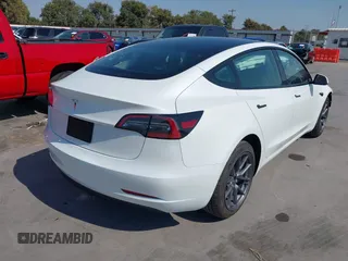 2023 Tesla Model 3 with VIN 5YJ3E1EA9PF585632, listed as a IAAI auction lot 40520993 with 7,775 mi miles and . Bid and sale history available at DreamBid. Image 4.