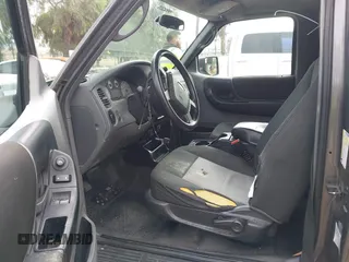 2011 Ford Ranger XL with VIN 1FTKR1EE4BPA46997, listed as a IAAI auction lot 41471483 with 217,874 mi miles. Bid and sale history available at carsss.com. Image 5.