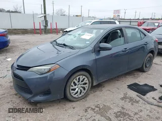 2018 Toyota Corolla L z VIN 5YFBURHE8JP762341, wystawiony jako IAAI lot #41616281 z przebiegiem 141 882 mil mil oraz . Historia ofert i sprzedaży dostępna na DreamBid. Obrazek 17.