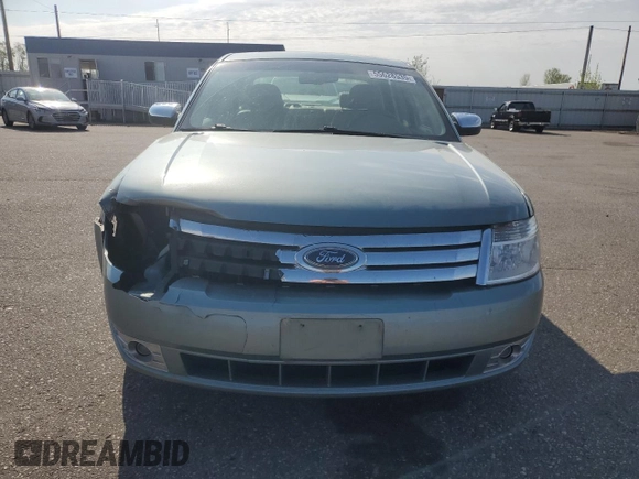 2008 Ford Taurus Limited with VIN 1FAHP25W28G121161, listed as a Copart auction lot 55628535 with 97,827 mi miles and Salvage title. Bid and sale history available at DreamBid. Image 5.