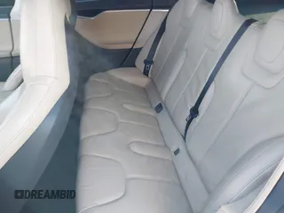 2013 Tesla Model S с VIN 5YJSA1DN9DFP06165, выставлен на аукционе IAAI как лот 40920844 с пробегом 181 342 миль миль и . История ставок и продаж доступна на DreamBid. Изображение 8.