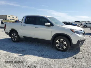 2019 Honda Ridgeline RTL-E with VIN 5FPYK3F72KB021673, listed as a Copart auction lot 50599005 with 65,469 mi miles and Salvage title. Bid and sale history available at DreamBid. Image 4.