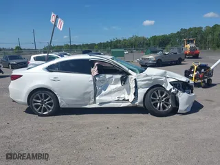 2016 Mazda Mazda6 i Grand Touring with VIN JM1GJ1W55G1443186, listed as a IAAI auction lot 42063716 with 114,263 mi miles. Bid and sale history available at carsss.com. Image 13.