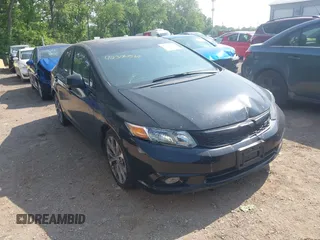 2012 Honda Civic Si with VIN 2HGFB6E52CH702849, listed as a IAAI auction lot 42396569 with 199,897 mi miles and . Bid and sale history available at DreamBid. Image 1.