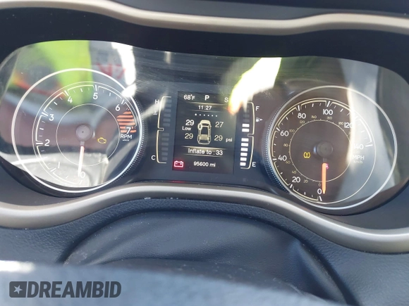 2016 Jeep Cherokee Altitude with VIN 1C4PJLCB6GW200348, listed as a IAAI auction lot 40791569 with 95,600 mi miles. Bid and sale history available at carsss.com. Image 7.