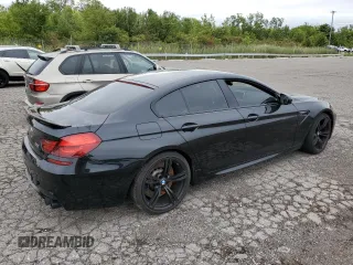 2015 BMW M6 z VIN WBS6C9C59FD467652, wystawiony jako Copart lot #66093293 z przebiegiem Nie podano mil oraz . Historia ofert i sprzedaży dostępna na DreamBid. Obrazek 3.