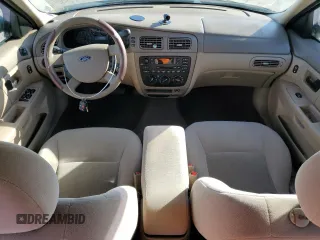 2004 Ford Taurus SE z VIN 1FAFP53284A156633, wystawiony jako Copart lot #58164985 z przebiegiem 91 246 mil mil oraz Szkoda całkowita • Salvage title. Historia ofert i sprzedaży dostępna na DreamBid. Obrazek 8.