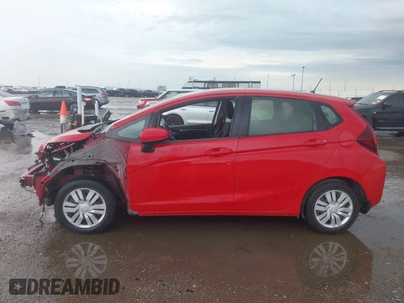2016 Honda Fit LX z VIN JHMGK5H58GS011783, wystawiony jako IAAI lot #42194425 z przebiegiem Nie podano mil oraz . Historia ofert i sprzedaży dostępna na DreamBid. Obrazek 14.