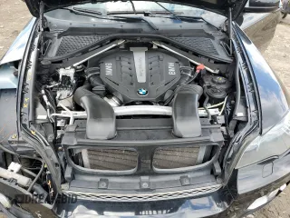 2012 BMW X6 50i z VIN 5UXFG8C51CLZ97393, wystawiony jako Copart lot #58407285 z przebiegiem 128 040 mil mil oraz Szkoda całkowita • Salvage title. Historia ofert i sprzedaży dostępna na DreamBid. Obrazek 12.